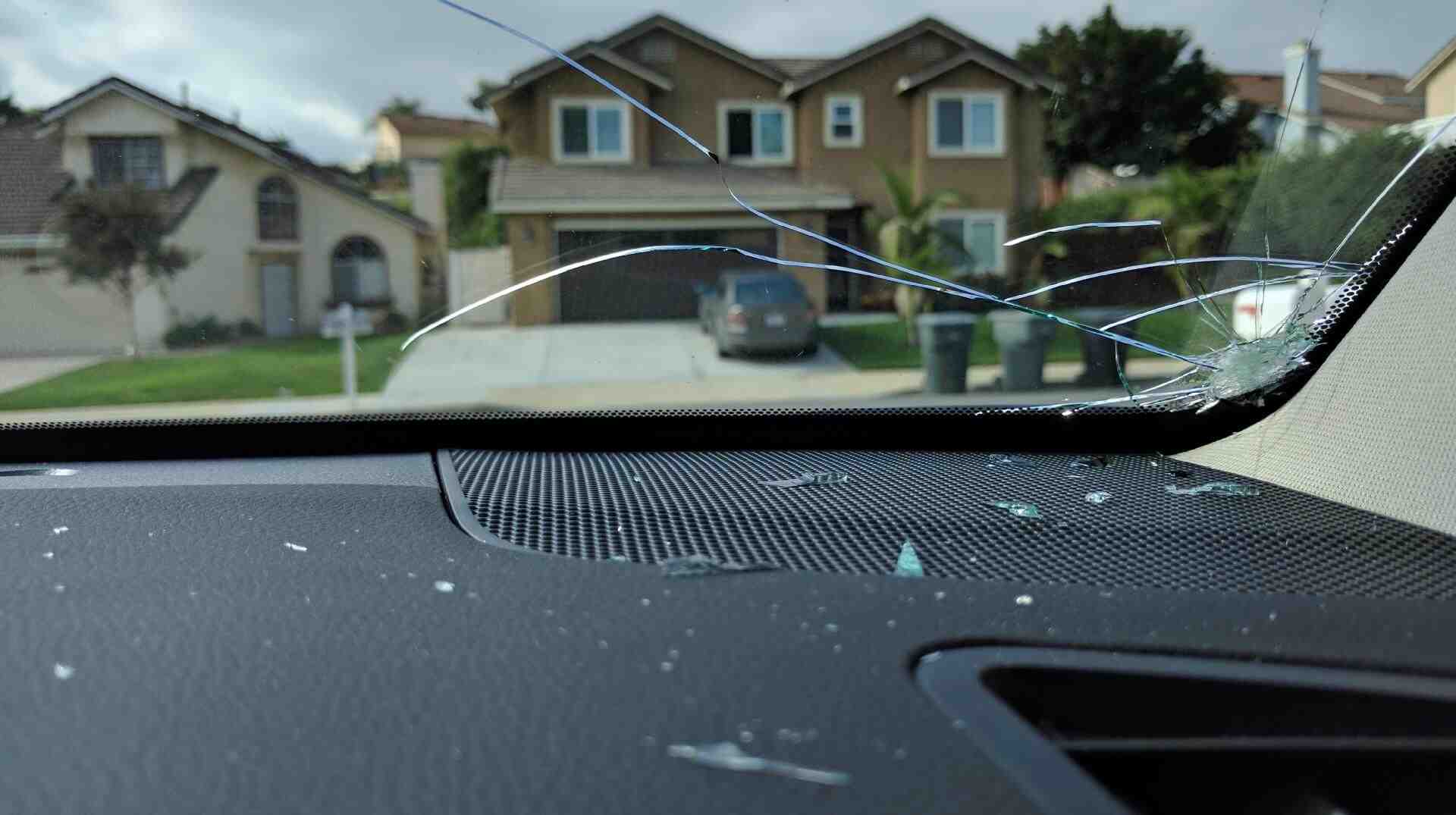 What causes windshield to crack?