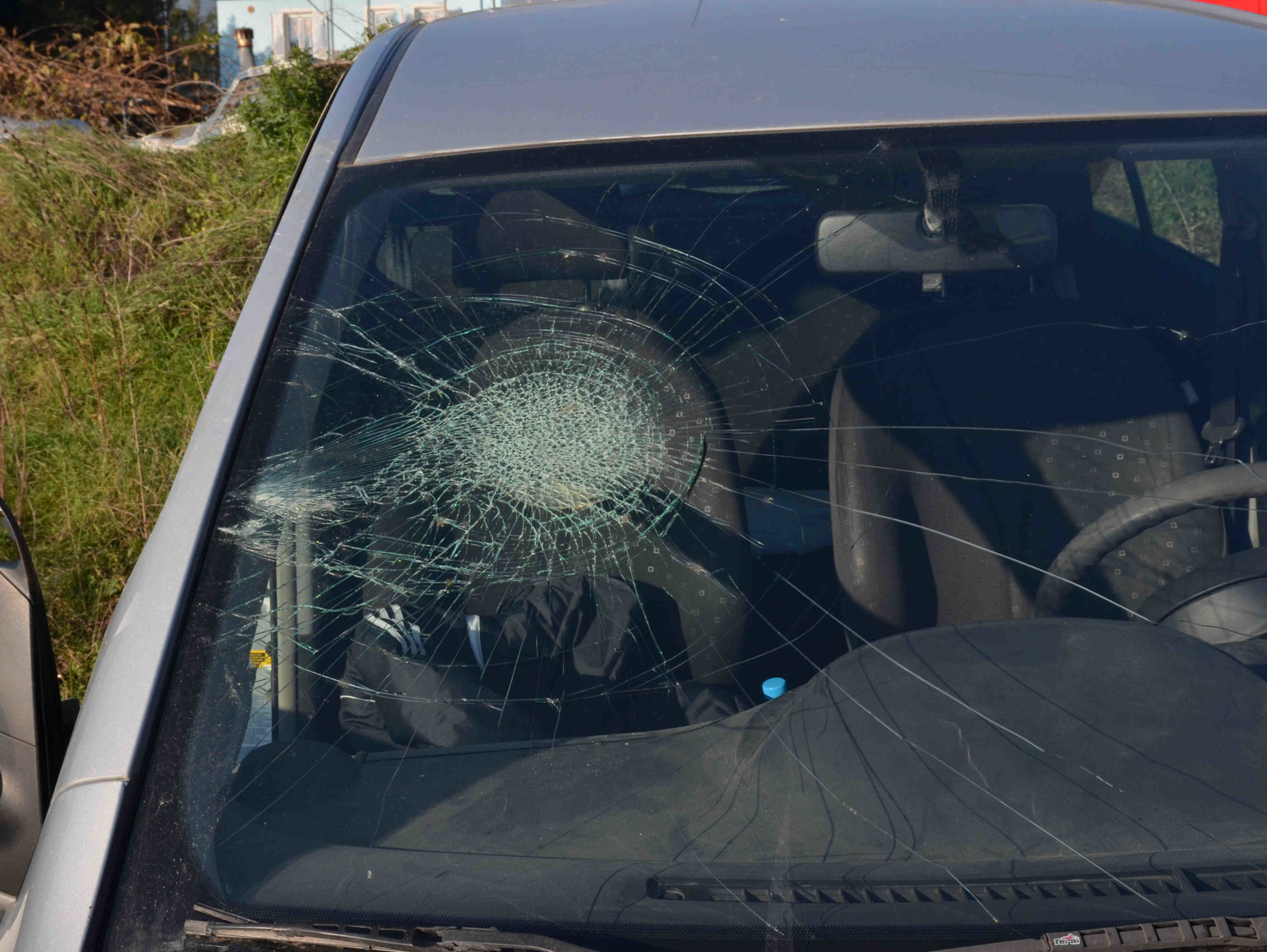 Who pays when a rock hits your windshield?